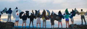 Boulder youth wearing bird wings