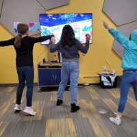 Teen's playing video games in the Main Library teen space