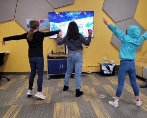 Teen's playing video games in the Main Library teen space