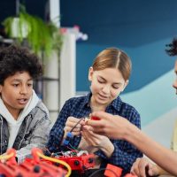 Kids using science equipment