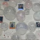 plastic bubbles with writing on them next to pictures of the people who wrote the text.